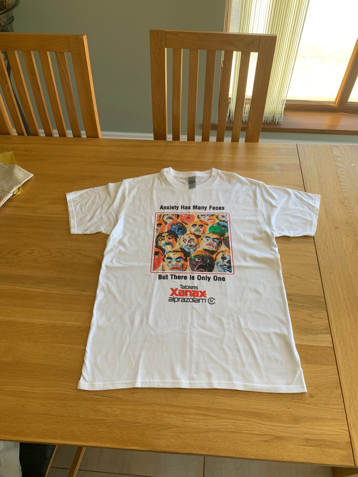 Xanax Anxiety Has Many Faces White Graphic Tee