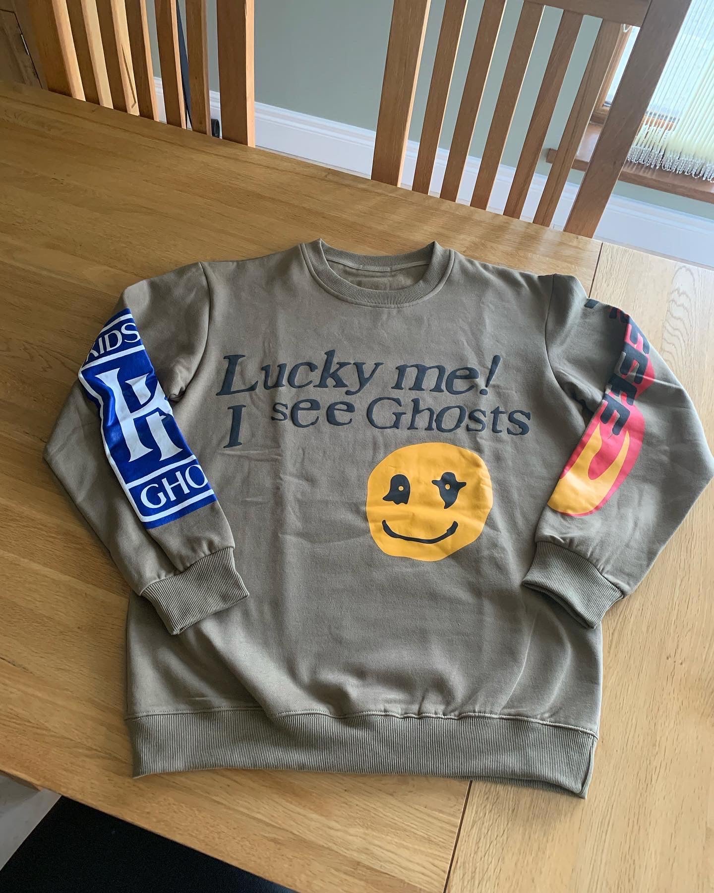 Lucky Me I See Ghosts Brown Graphic Sweatshirt